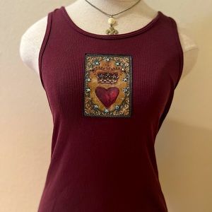 Burgundy colored tank. Size small/medium. Like new